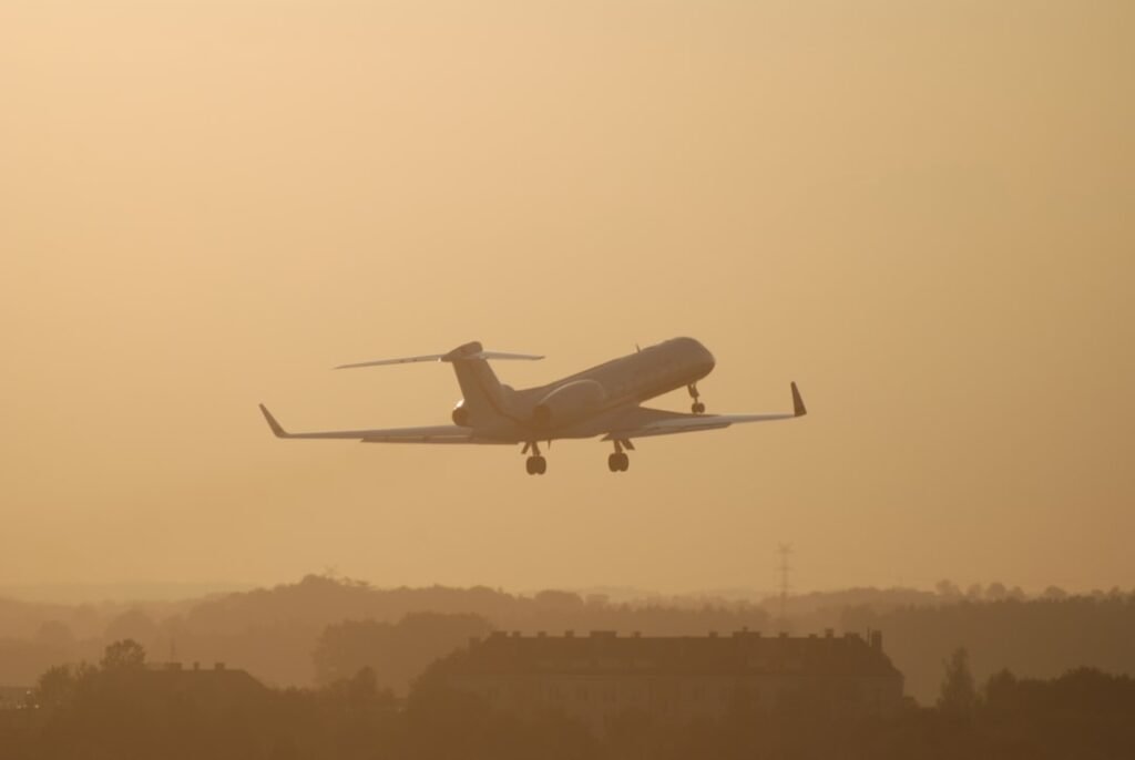Gulfstream jet taking off into sunset